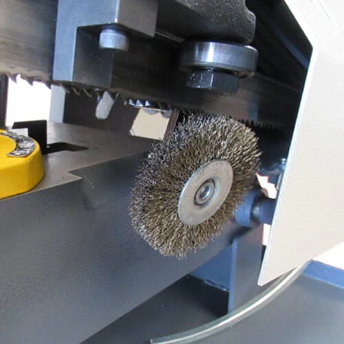 Band saw chip brush and chip removal