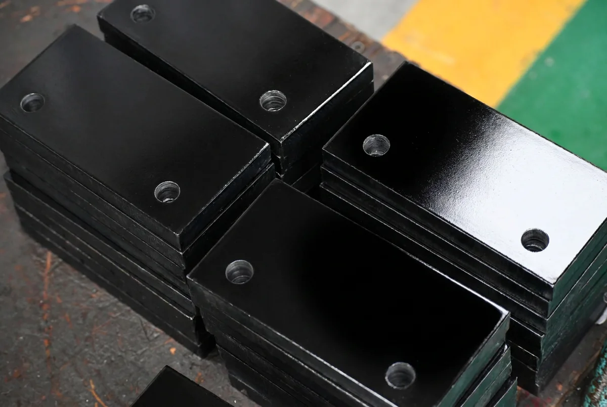 CNC drilling of machinery base and mounting plates