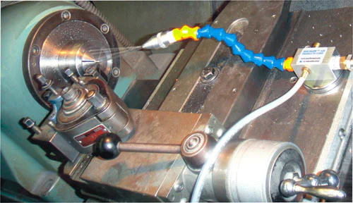 Band saw coolant pump and nozzle