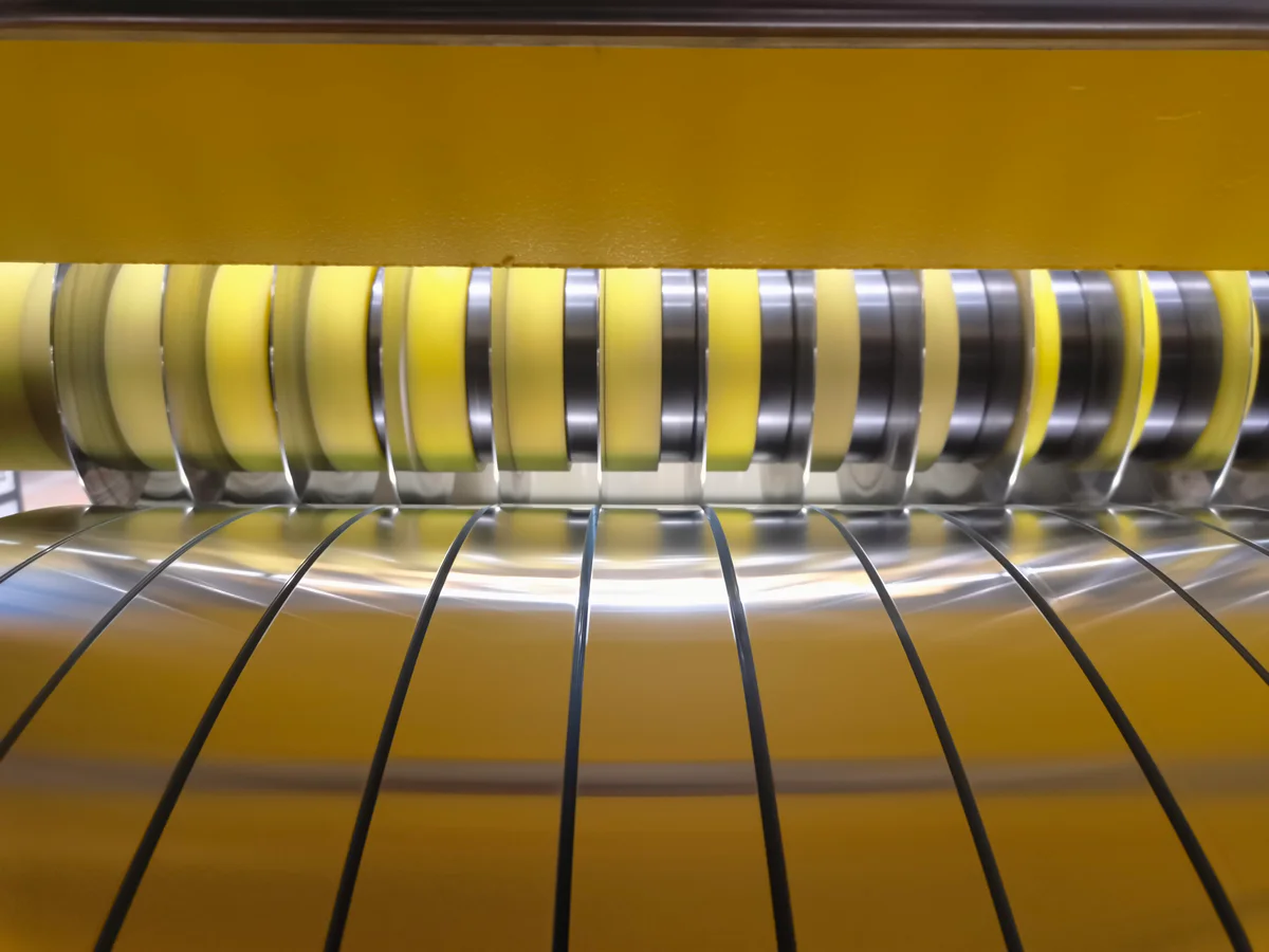 Surface protected slit coil