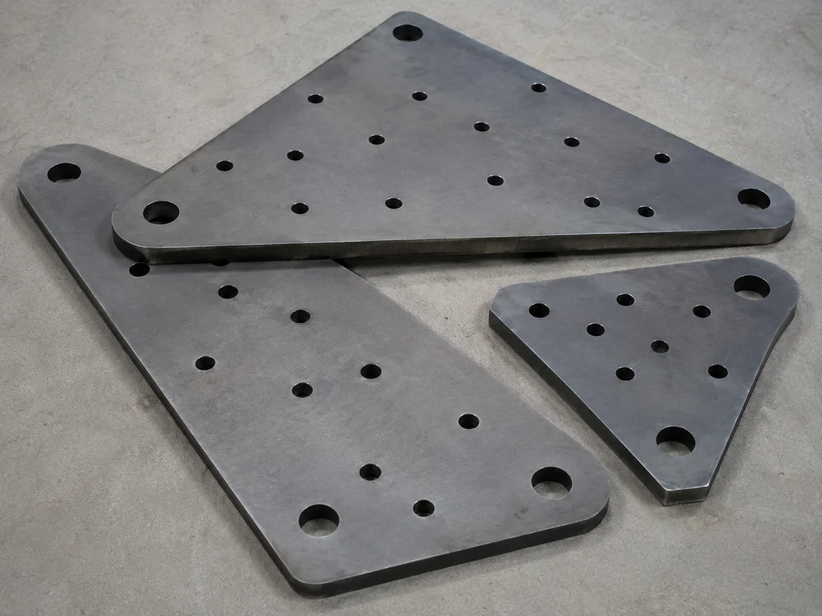Gusset plates for steel frames and structural joints