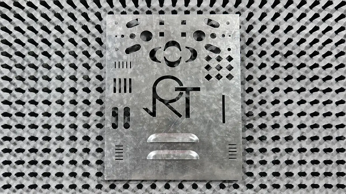 Punched round and square holes in sheet metal panel