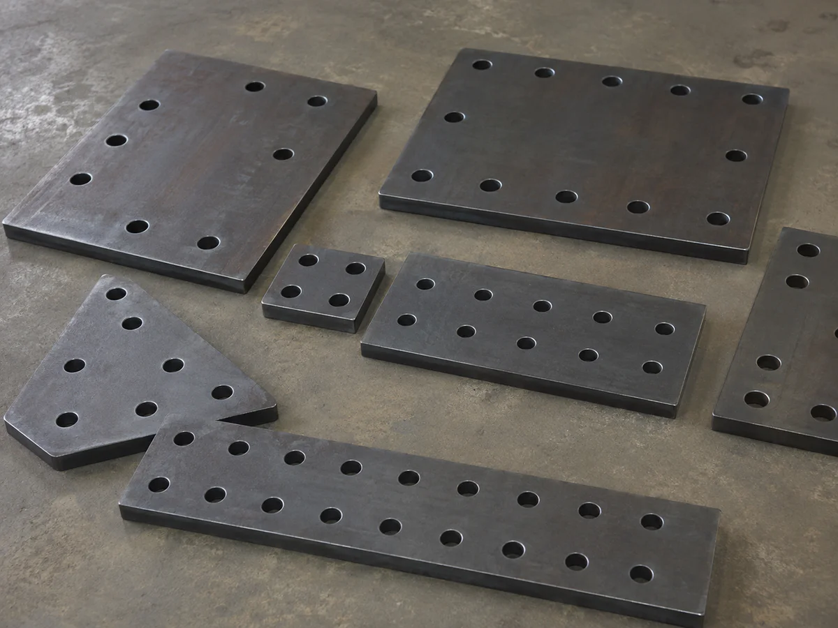 Flat steel stiffener plates with repeated hole patterns